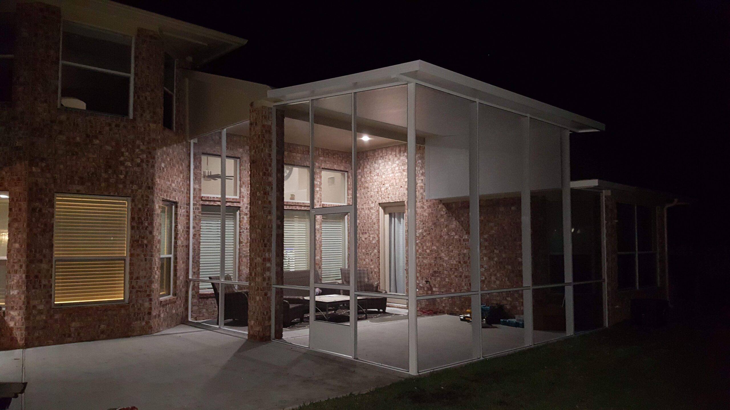 Screened outdoor room before full rescreening