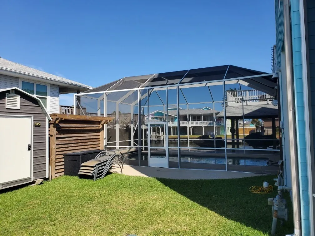 Debris-damaged patio screen enclosure repair in Florida